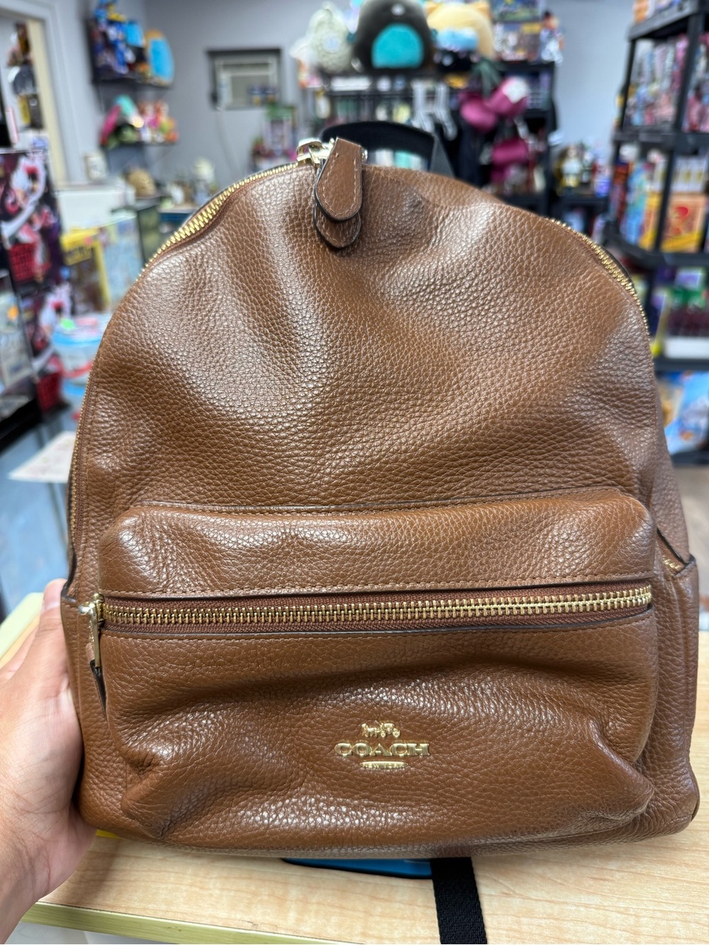 Coach Brown Pebbled Leather Backpack with Gold Hardware